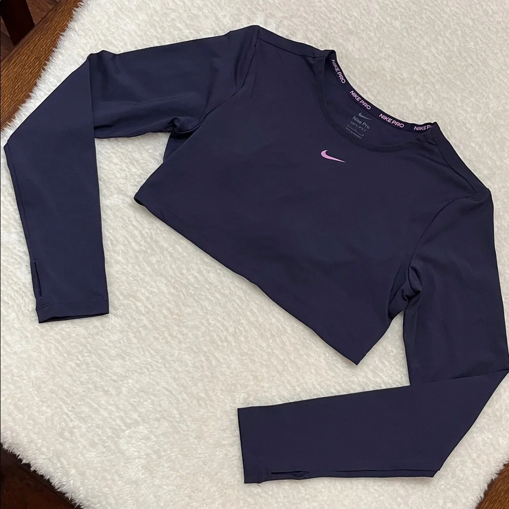 NIKE Pro Dri-FIT Long Sleeve Crop Top with Crisscross Logo Strap Details